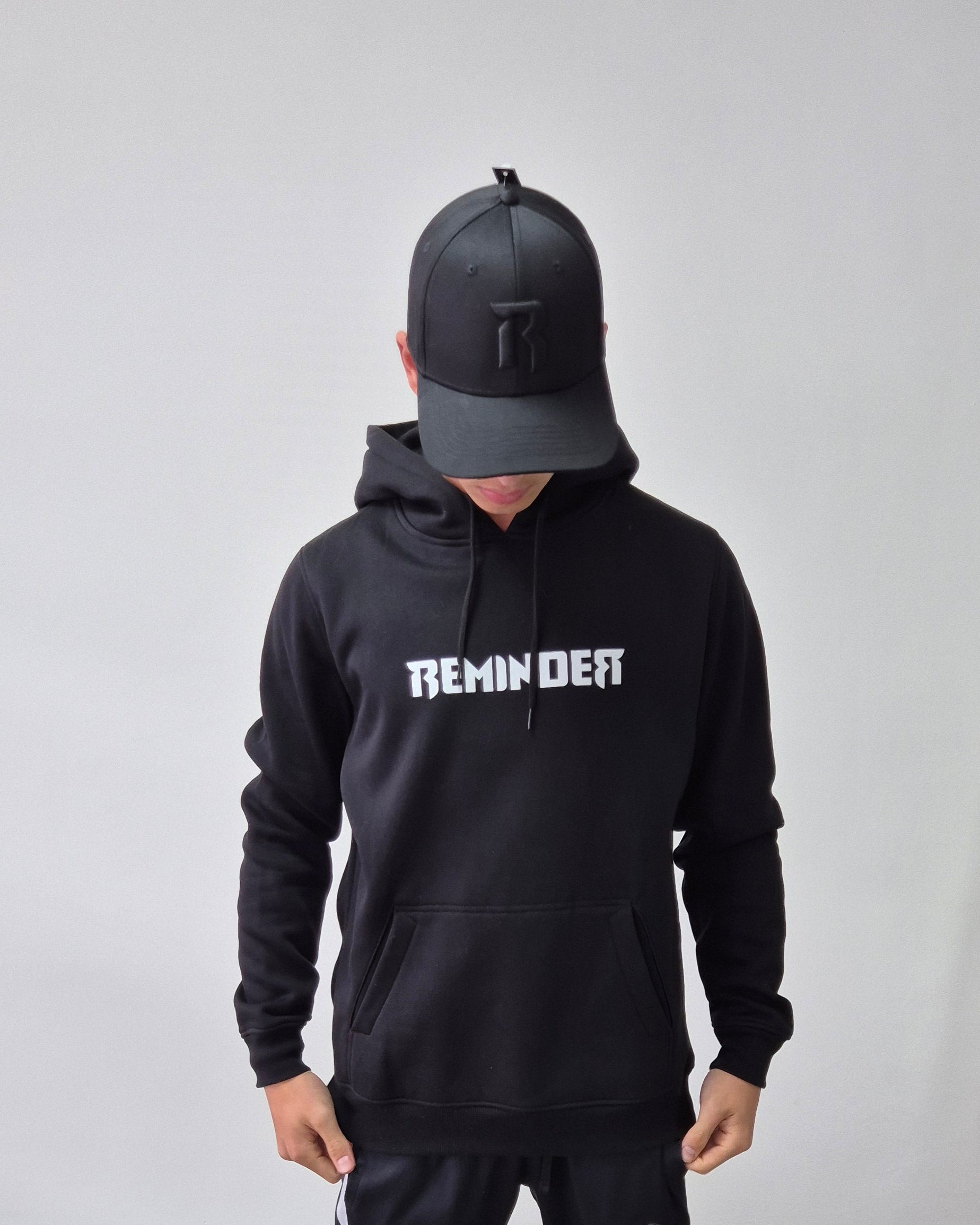 reminder hoodie witte logo tekst